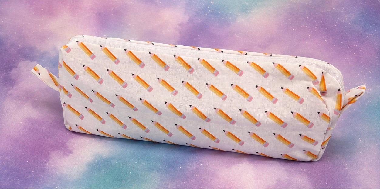 Handmade white zipper pouch printed with colorful pencils